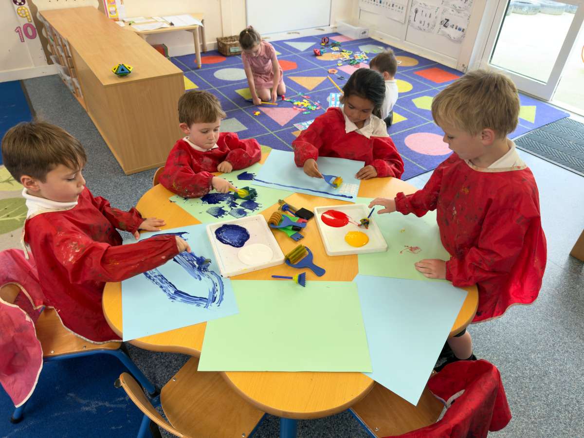 Children engaged in creative art activities.