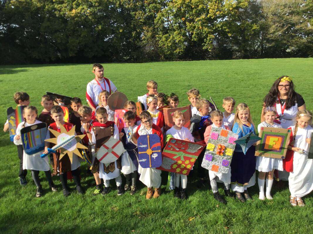 Children dressed in historical costumes outdoors
