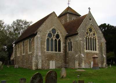 Historic stone church with graveyard.